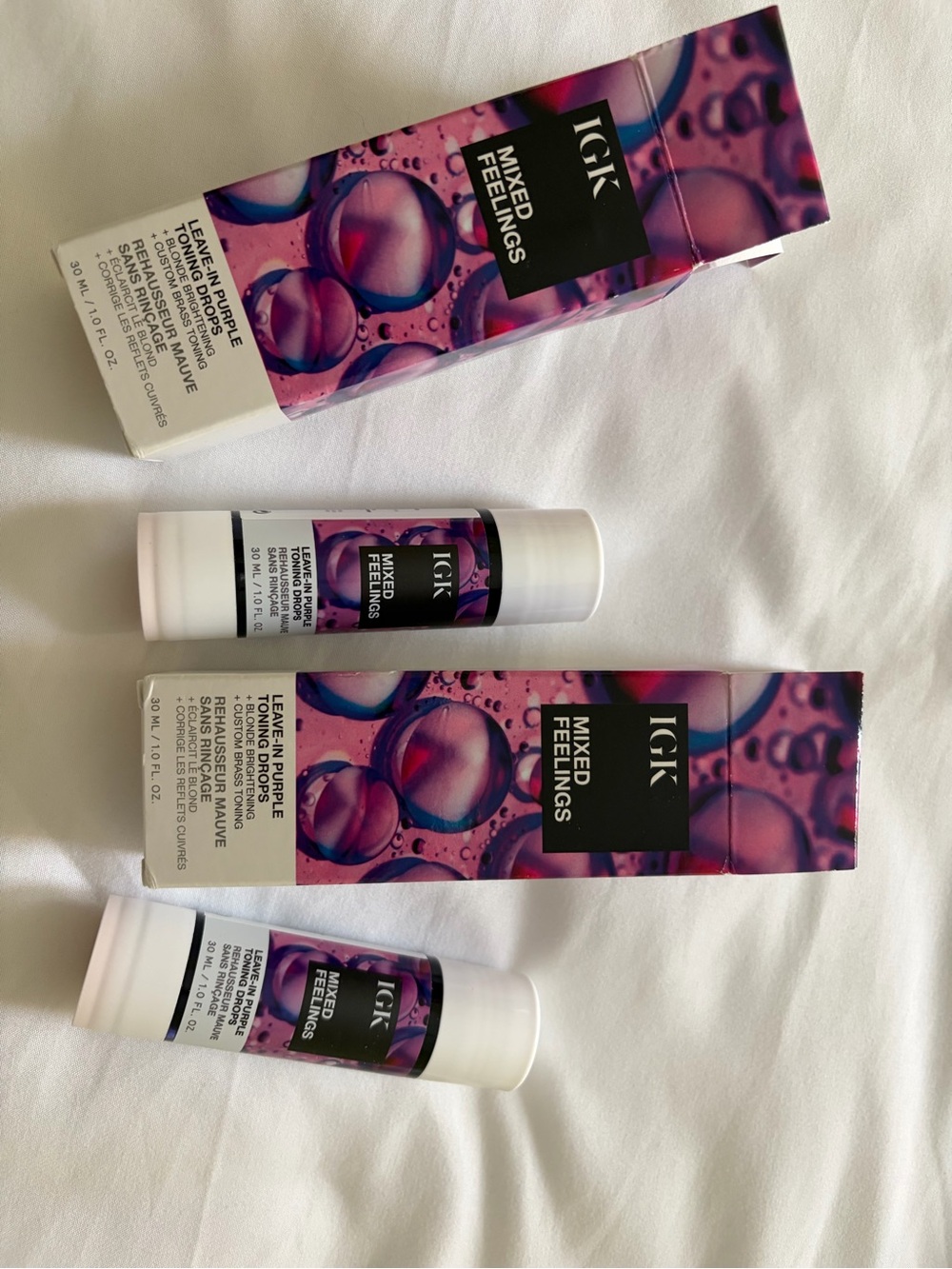 Set of two new IGK Mixed Feelings Leave-In Toning Drops — Purple